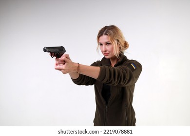 Ukrainian Female Soldier With A Small Pistol