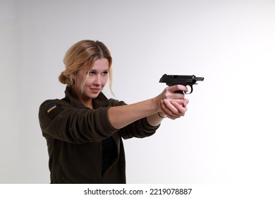 Ukrainian Female Soldier With A Small Pistol