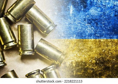 Ukrainian Flag. Bullet Shells Texture. Flag Of Ukraine. Grunge Industrial War Background. Dirty Flag Texture. Blue And Yellow Color Country Symbol. Weapon Bullets On Flag.