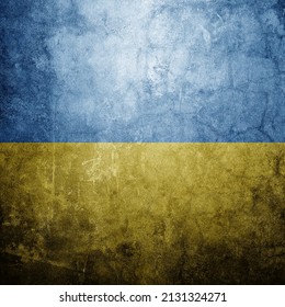 Ukrainian flag on background wall referring to their current war with Russia - Shutterstock ID 2131324271