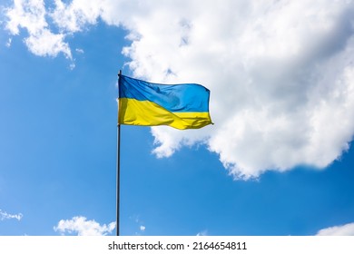 Ukrainian flag on blue sky backgroud