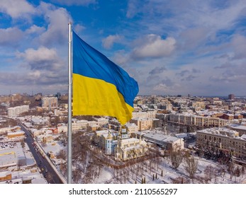 Ukrainian flag in the wind. Blue Yellow flag in the city of Kharkov.