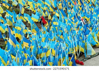 Ukrainian flags with the names of the killed heroes and soldiers of the Ukrainian army on Maidan in Kyiv Ukraine - Shutterstock ID 2271590171