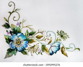 Ukrainian Hand Embroidery On Fabric. Embroidered Blue Flowers. Ethnic Art Satin Stitch Embroidery.