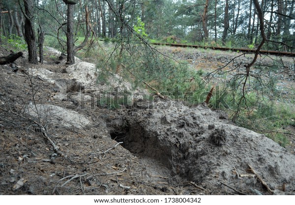 Ukrainian metal thieves destroy the infrastructure of the railway. Pits and dumps after theft of the railway cable. Copper mining. May 22, 2020 in Kiev,Ukraine