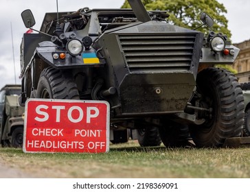 Ukrainian Military Checkpoint With Tank Armoured Personnel Vehicle On Boarder Of Ukraine. Stop Check Point Red Sign Army Equipment.