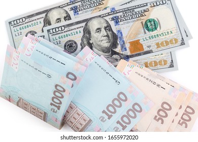 Ukrainian Money - Hryvnia Banknotes USA Dollars Bills. Finance In Ukraine, Of The Hryvnia To The Dollar Exchange Rate. Multi Currency Money Dollars And Hryvnia, Close-up Concept Finance Investment.