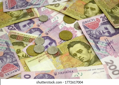 Ukrainian Money - Hryvnia Banknotes USA Dollars Bills. Finance In Ukraine, Of The Hryvnia To The Dollar Exchange Rate. Multi Currency Money Dollars And Hryvnia, Close-up Concept Finance Investment.
