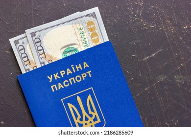 Ukrainian Passport And Several Dollar Bills. Fight Against Corruption In Ukraine. Anti-corruption Laws In Ukraine. Ukrainian Corruption.