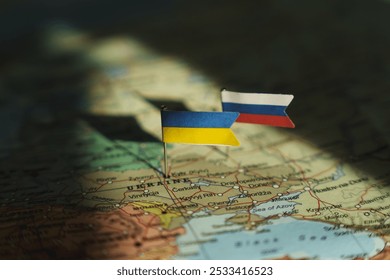 Ukrainian and Russian flag on Ukraine geopolitical map. War, Conflict, Crisis concept in Europe. High quality photo - Powered by Shutterstock