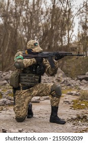 Ukrainian Soldier Of The Armed Forces Of Ukraine Sits Taking Aim