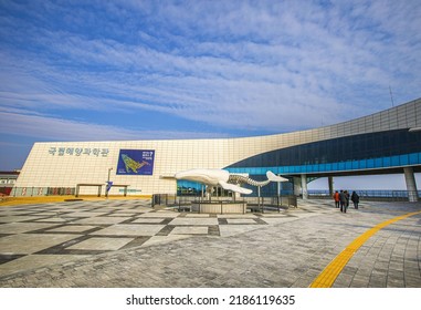 Uljin-gun, Gyeongsangbuk-do, South Korea - January 19, 2022: Morning View Of Whale Shape Sculpture And Tourists On Square In Front Of National Maritime Science Museum
