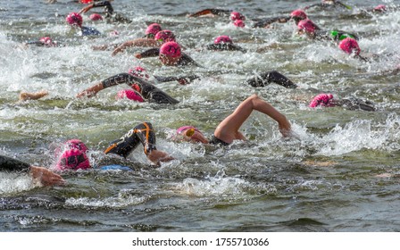 Ullswater, Cumbria / United Kingdom - June 04 2017: The Chaos Of The Race Start, At An Ullswater Open Water Swimming Event In 2017.