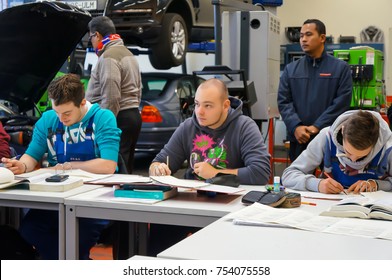 ULM,GERMANY- NOVEMBER 27,2013: Unidentified Group Of Students Doing Their Work In A Classroom Workshop Near Robert Bosch Vocational School, Ulm.