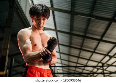 Ultimate Fighter Getting Ready, Muscled Fighter Wearing Black Strap On Wrist