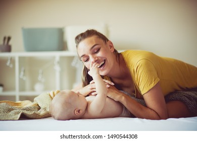  The Ultimate Gift Of Love. Mother And Her Baby Boy At Home.