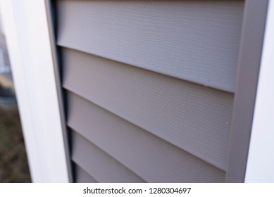 Ultra Close Up Vinyl Siding Texture On New Home