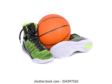 Ultra Modern High-top Green And Black Basketball Shoes Sneakers With A Basketball, Isolated On White