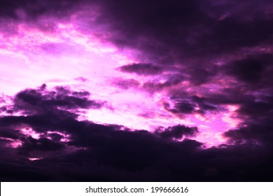 Ultra Violet Radiation. Dark Clouds In The Sky Over Sun, Violet Toning. Abstract Background.