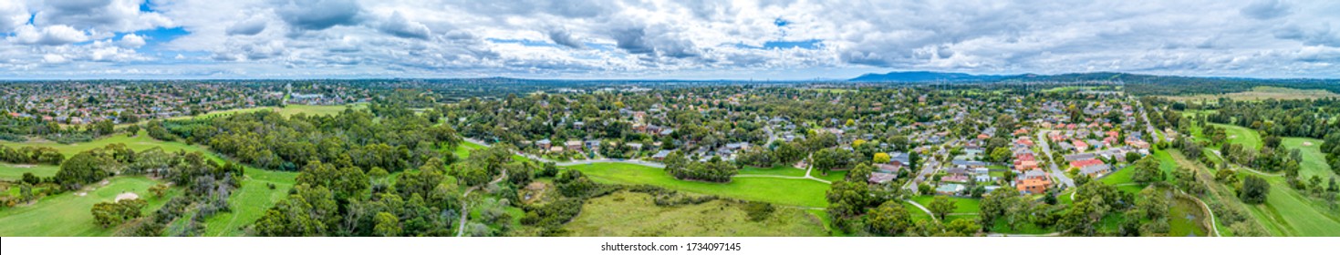 Ultra wide aerial panorama of Dandenong North suburb and parklands in Melbourne, Australia