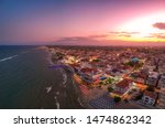 Ultra wide aerial panorama view over the coastal town of Paralia Katerini, Greece at sunset. Located about 8 Km from the city of Katerini in Pieria, central Macedonia, Greece, Europe.