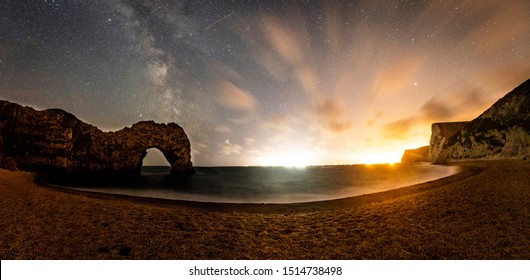 Ultra Wide Panoramic View Of The Durdle Door At Night With The Milkyway