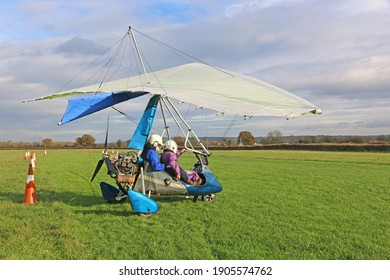 Ultralight airplane in a landing field	