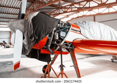 Ultralight Small Private Aircraft Airplane On Repair In The Hangar At The Aerodrome Airport