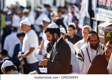 Ultra-Orthodox Jewish Hasids pilgrims pray on the street near the tomb of Rabbi Nachman of Breslov on the eve of Rosh Hashanah holiday, the Jewish New Year, in Uman, Ukraine. September 2016