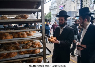 Ultra-Orthodox Jewish Pilgrims Buy Bread On The Street Near The Tomb Of Rabbi Nachman Of Breslov During The Celebration Of Rosh Hashanah Holiday, The Jewish New Year, Uman, Ukraine September 25, 2022