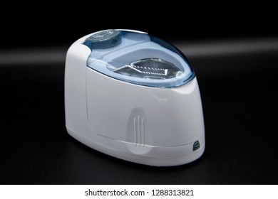 Ultrasonic Cleaner On Black Background