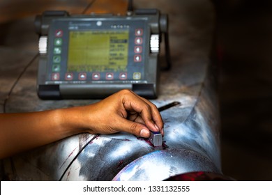 Ultrasonic inspection  weld joint at root pass with angle probe - Shutterstock ID 1331132555