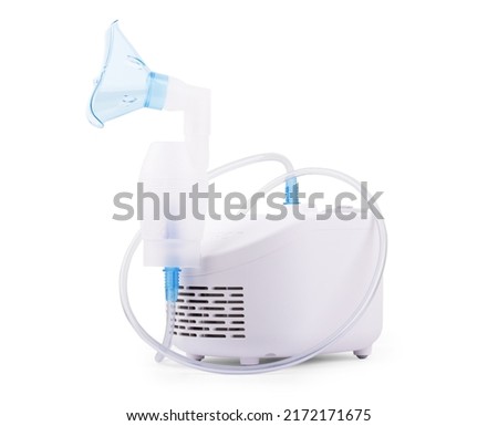 Ultrasonic nebulizer and medicines on a white background 