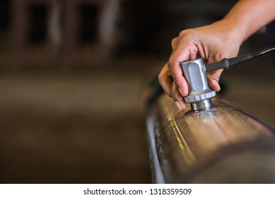 Ultrasonic test to detect imperfection or defect of round bar steel raw material in factory, NDT Inspection. - Shutterstock ID 1318359509