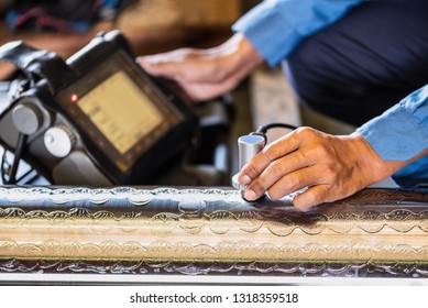 Ultrasonic test to detect imperfection or defect of round bar steel raw material in factory, NDT Inspection. - Shutterstock ID 1318359518