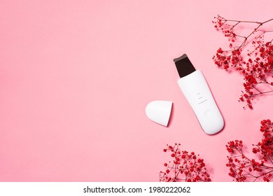 Ultrasonic Water Peeling Home Device On Pink Background