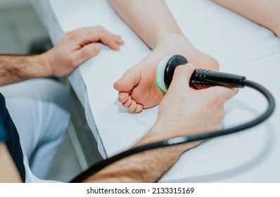 Ultrasound treatment on the foot - Powered by Shutterstock