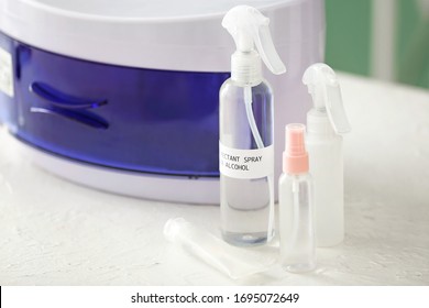 Ultraviolet Sterilizer With Disinfectants On Table In Clinic