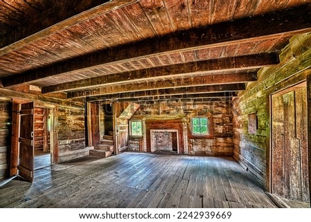 An ultra-wide-angle photograph of the interior of one of the pioneer cabins in the Cades Cove section of the Great Smoky Mountains National Park