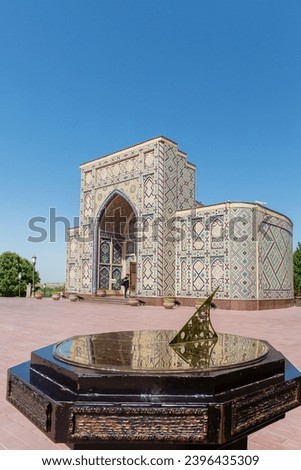 Ulugh Beg Observatory Madrasa. Main Entrance with sundial at foreground. Blue sky at background. Cover page, copy space. Samarkand, Uzbekistan
