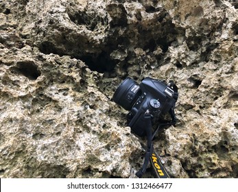 Ululatu, Bali / Indonesia - February 14 2019: Camera Nikon D750 Lies On The Stones.