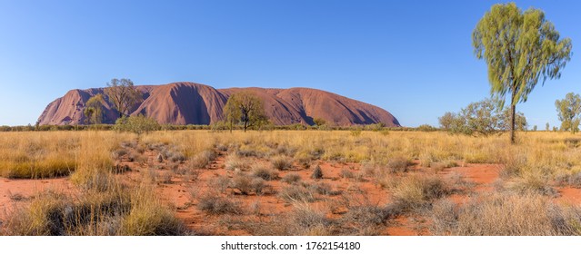 Uluru, Northern Territory, Australia - March 23, 2020: : Uluru or Ayers Rock is a huge sandstone monolith within Uluru-Kata Tjuta National Park in central Australia, Northern Territory. 