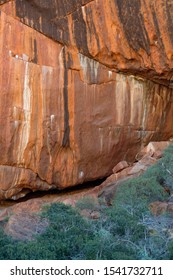 Uluru, Northern Territory / Australia - May 18 2018: Closeup Of Uluru From The Base Walk With Natural Tones And Colours Of Ayers Rock