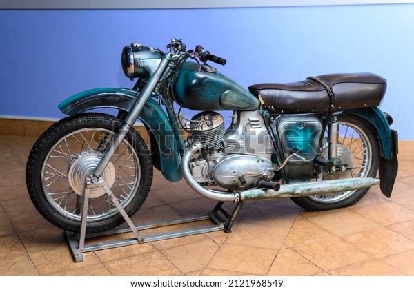 Ulyanovsk, Russia - February 11, 2022: Vintage\
motorcycle brand IZH-3. The museum presents an old Russian\
motorcycle IZH-Planet\
3.