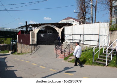 Uman, Ukraine, 30.04.2011 A man in a white shirt and Jewish hat - kippah - is going along the road. Grave of Rebbe Nachman of Breslov