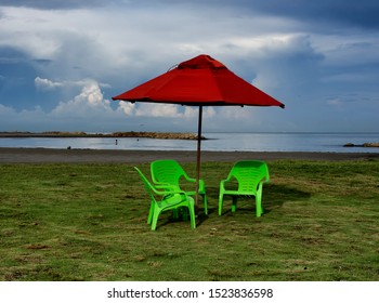 Umbrella And Beach Chairs On The Beach Of Cartagena Colombia At The Morning