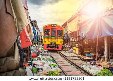  Umbrella market Maeklong Railway Train Market in Maeklong Samut Songkhram Thailand