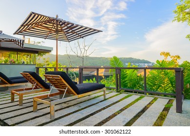 Umbrella Pool Chair On Roof Top