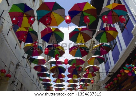 Umbrellas and Chinese lanterns decorations taken at Ipoh, Malaysia.