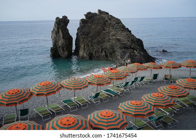 Umbrellas On The Beach In Monterosso